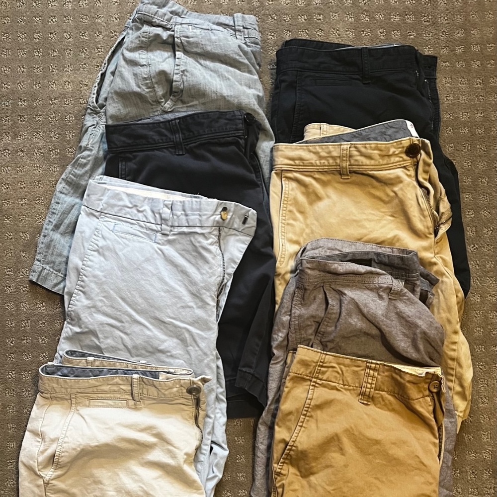 12 Polos, 2 Hoodies 1 Zip up, 8 pairs of shorts, 4 Long sleeve button ups, Boots